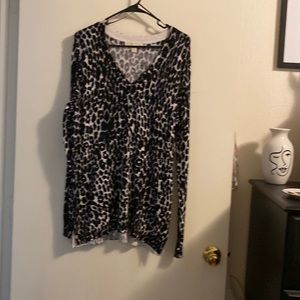 Long sleeve leopard print v neck tunic shirt.